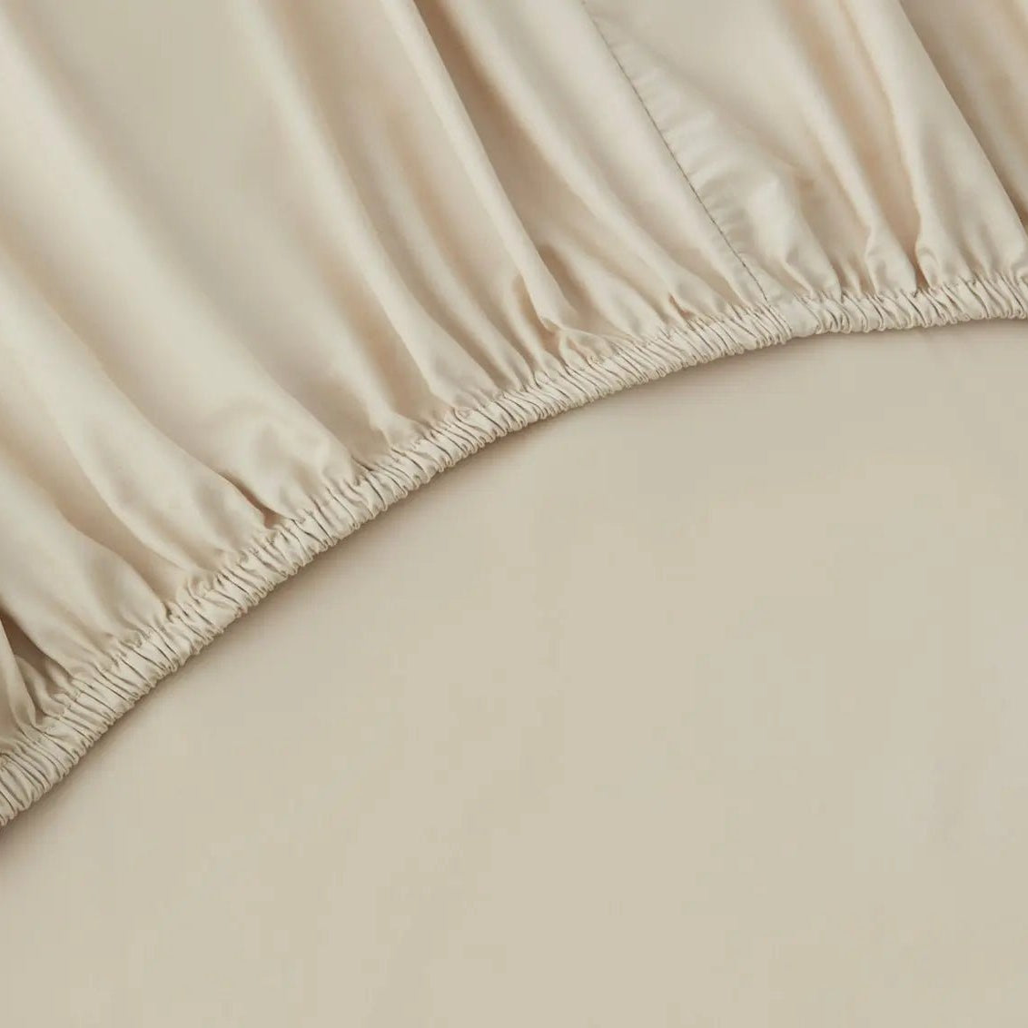 Close-up of a beige fitted sheet