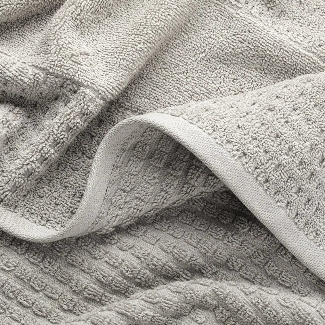 Close-up of light gray waffle towel fabric