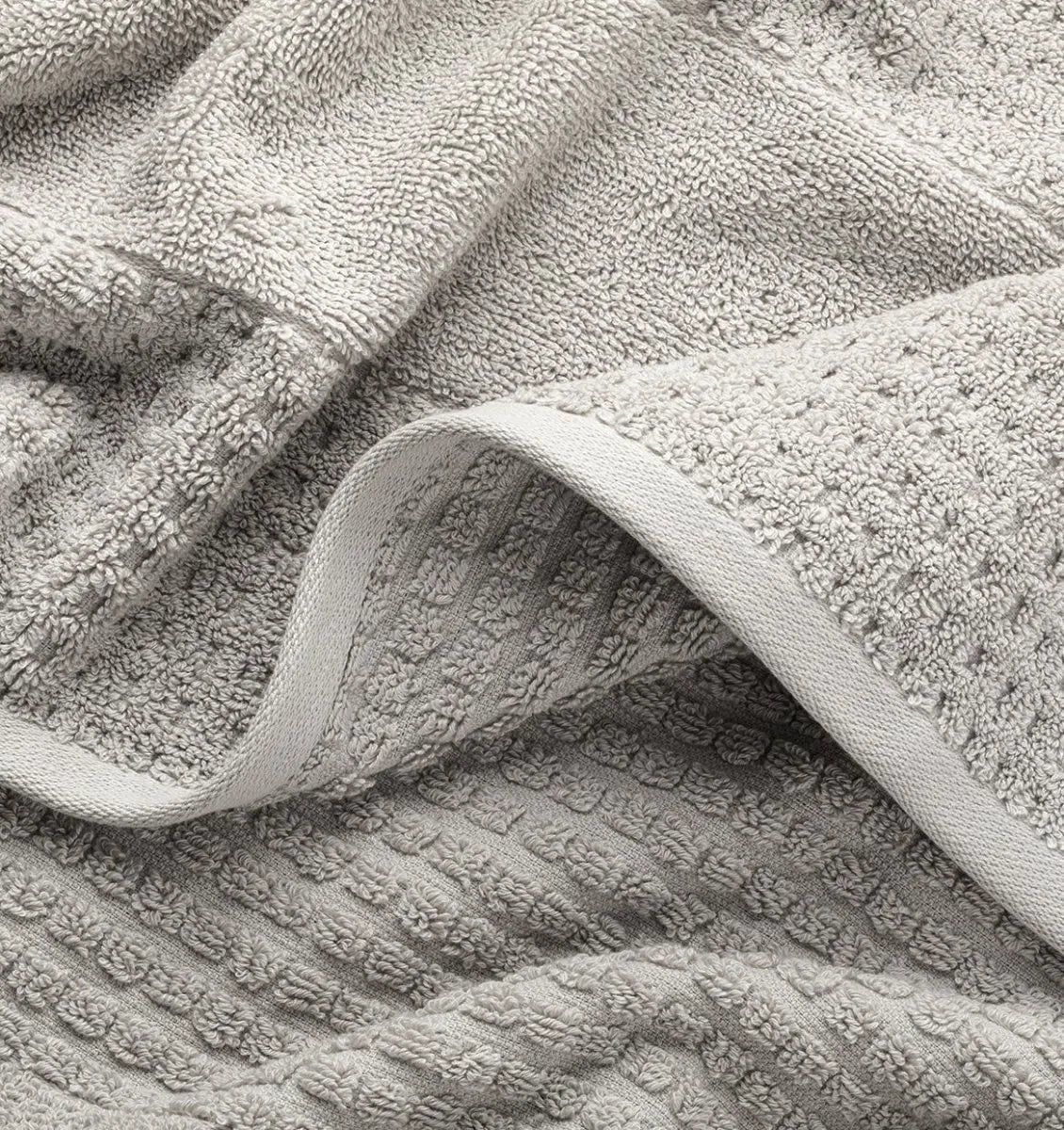 Close-up of light gray waffle towel fabric