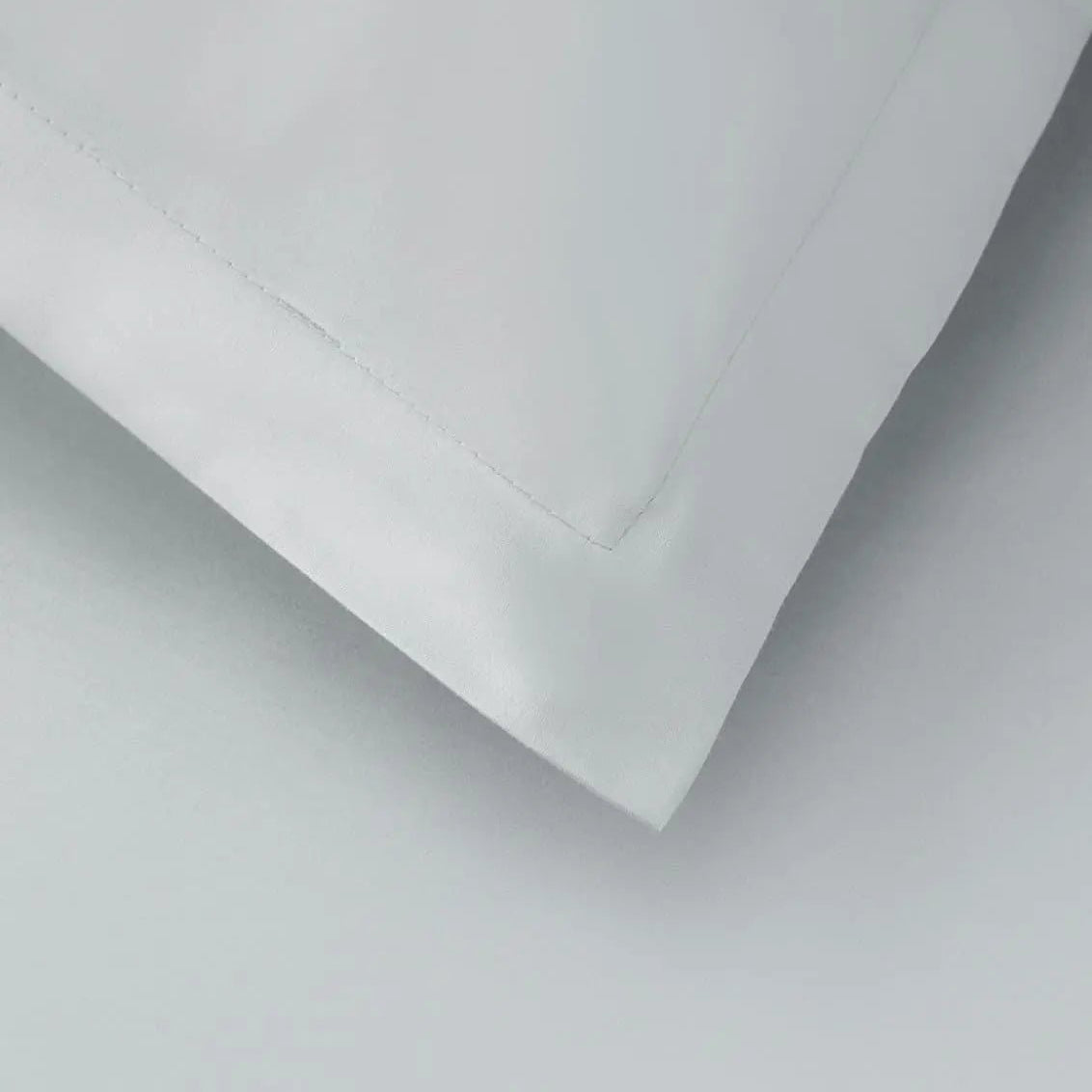 Close-up of a tin colored fabric bed sheet