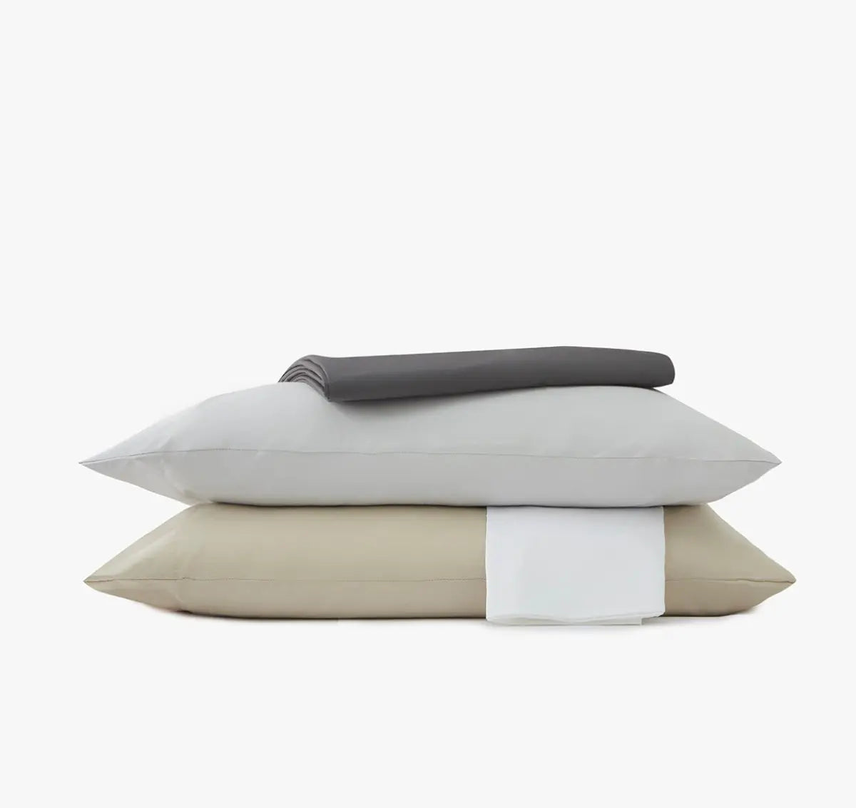 Stacked pillowcases and sheet set of various colors