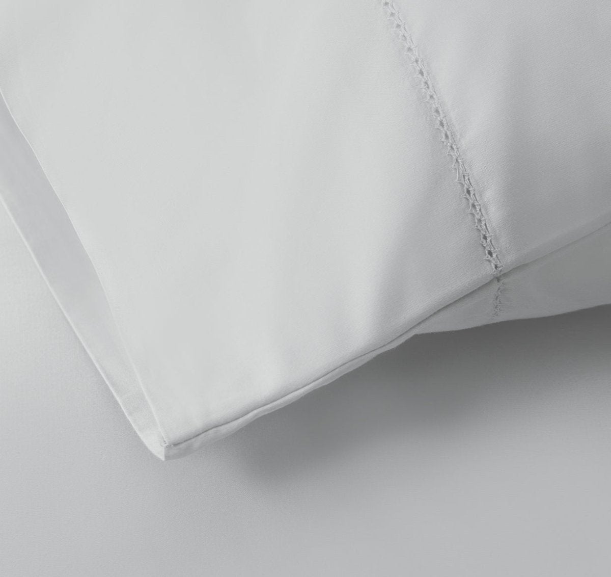 Signature Hemstitch Organic Pillowcase Set Tin Detail | Duman Home