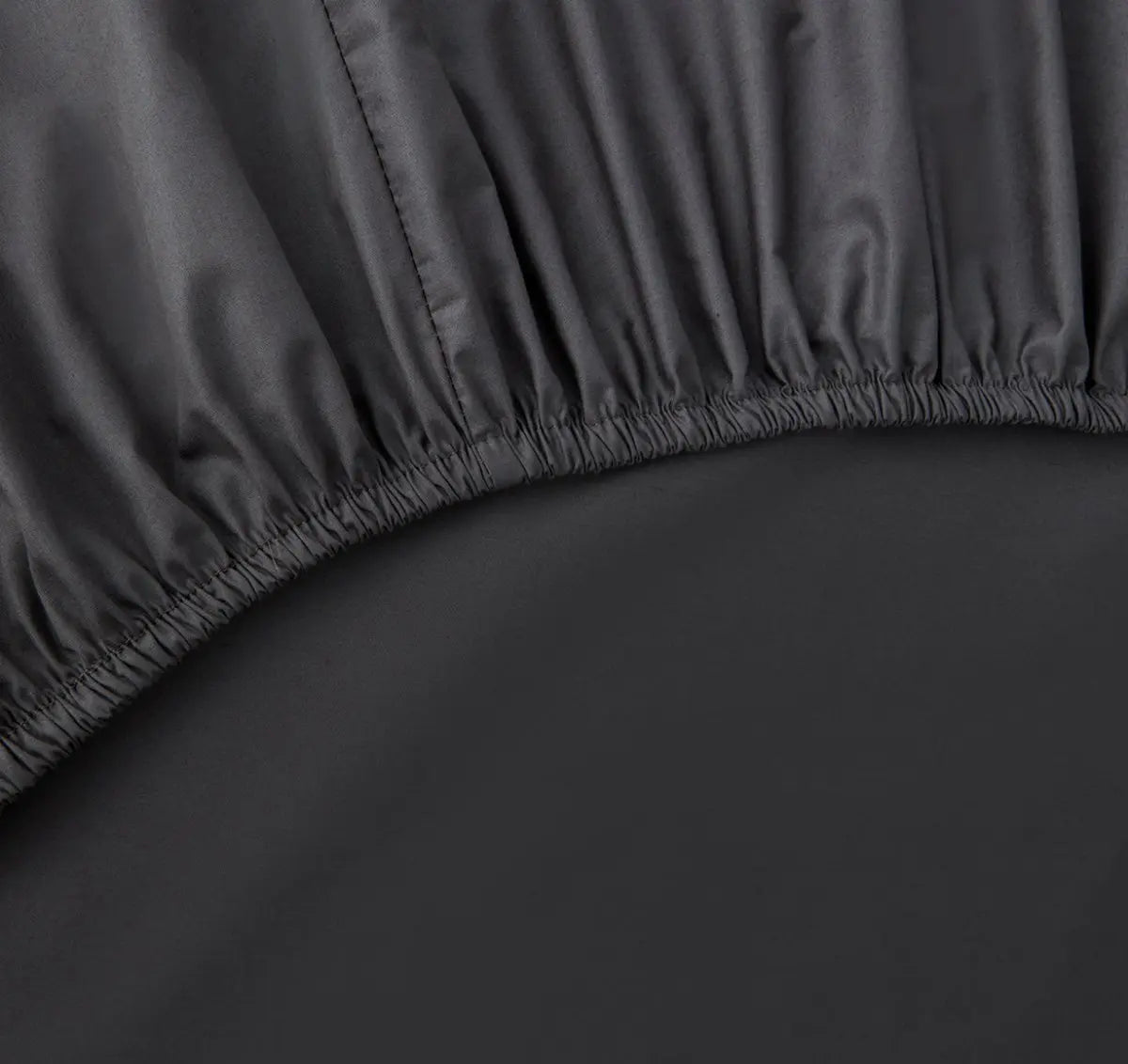 Close-up of a slate gray fitted sheet