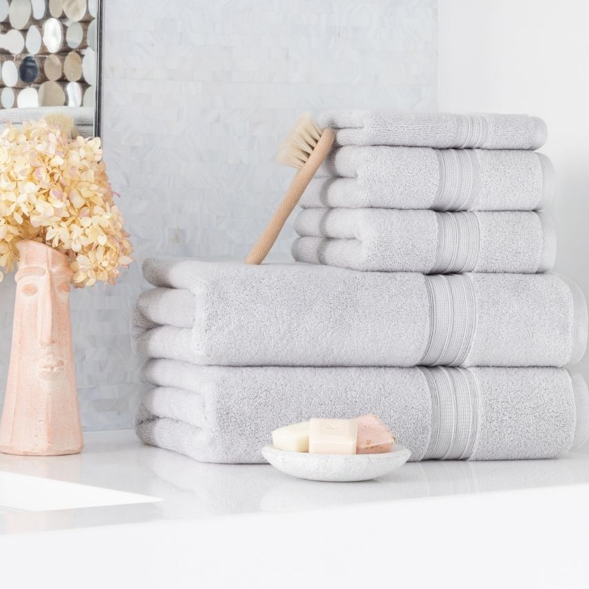 Bundle of Super-Plush Towels Smoke color in a bathroom setting