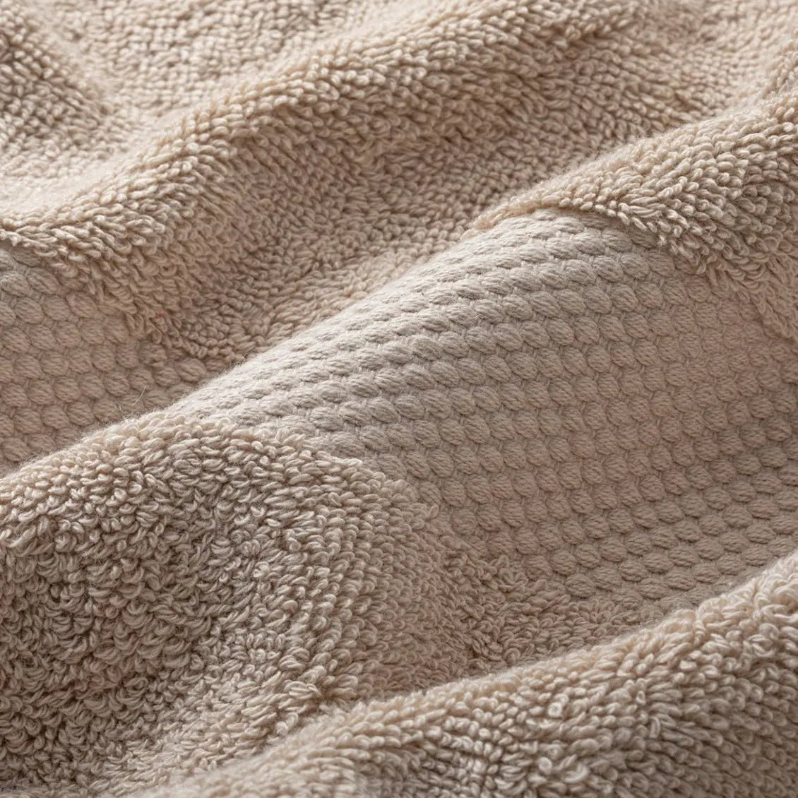 Close-up of a textured beige Premium Turkish Cotton Towel