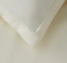 Ivory bedding detail pillow and sheett