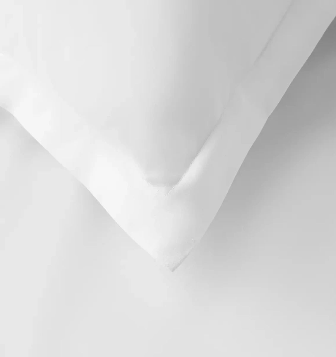 Close-up of white bedding cover