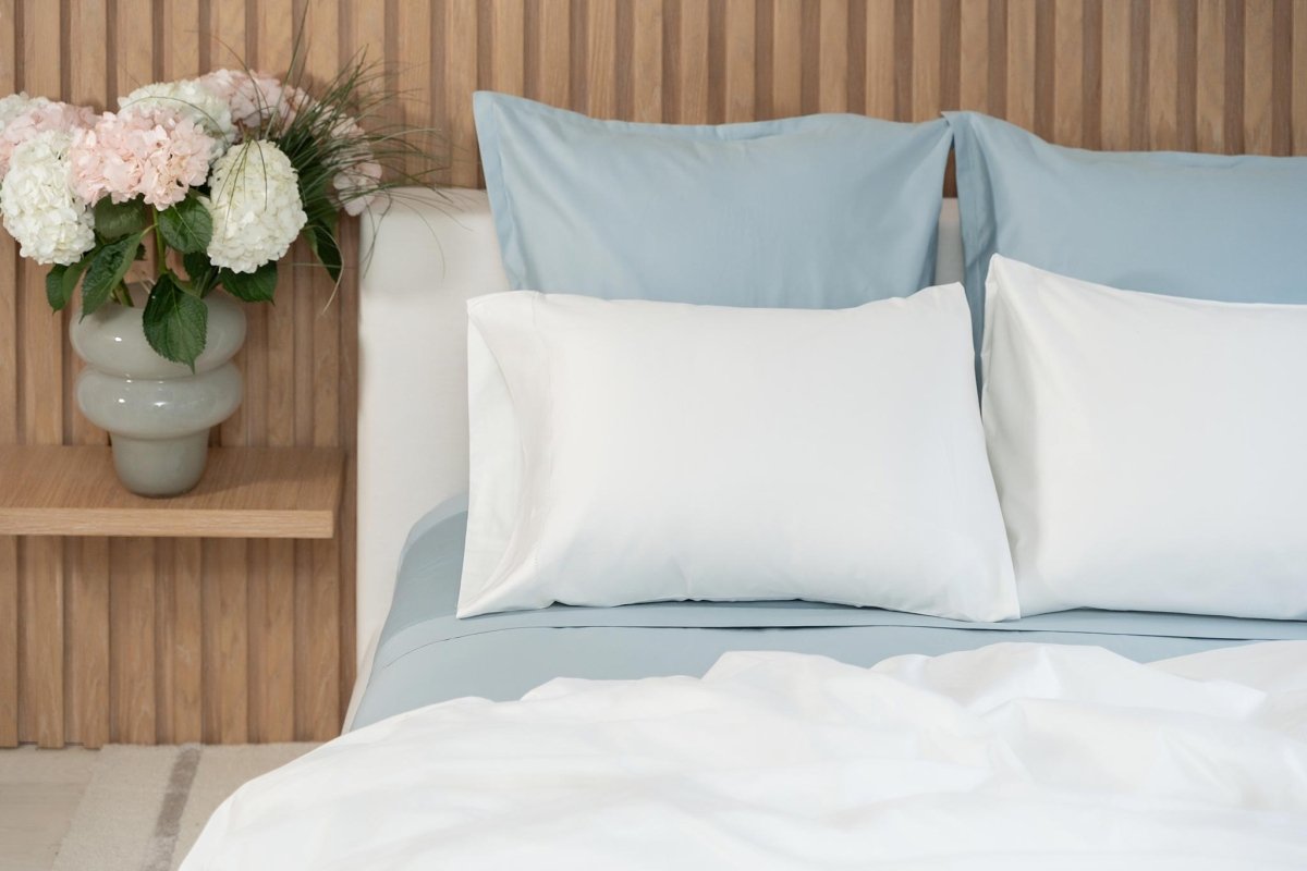 all-groups Signature Hemstitch Organic Pillowset shown in Bed| Duman Home