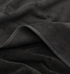 Close-up of a dark gray coal towel with visible texture