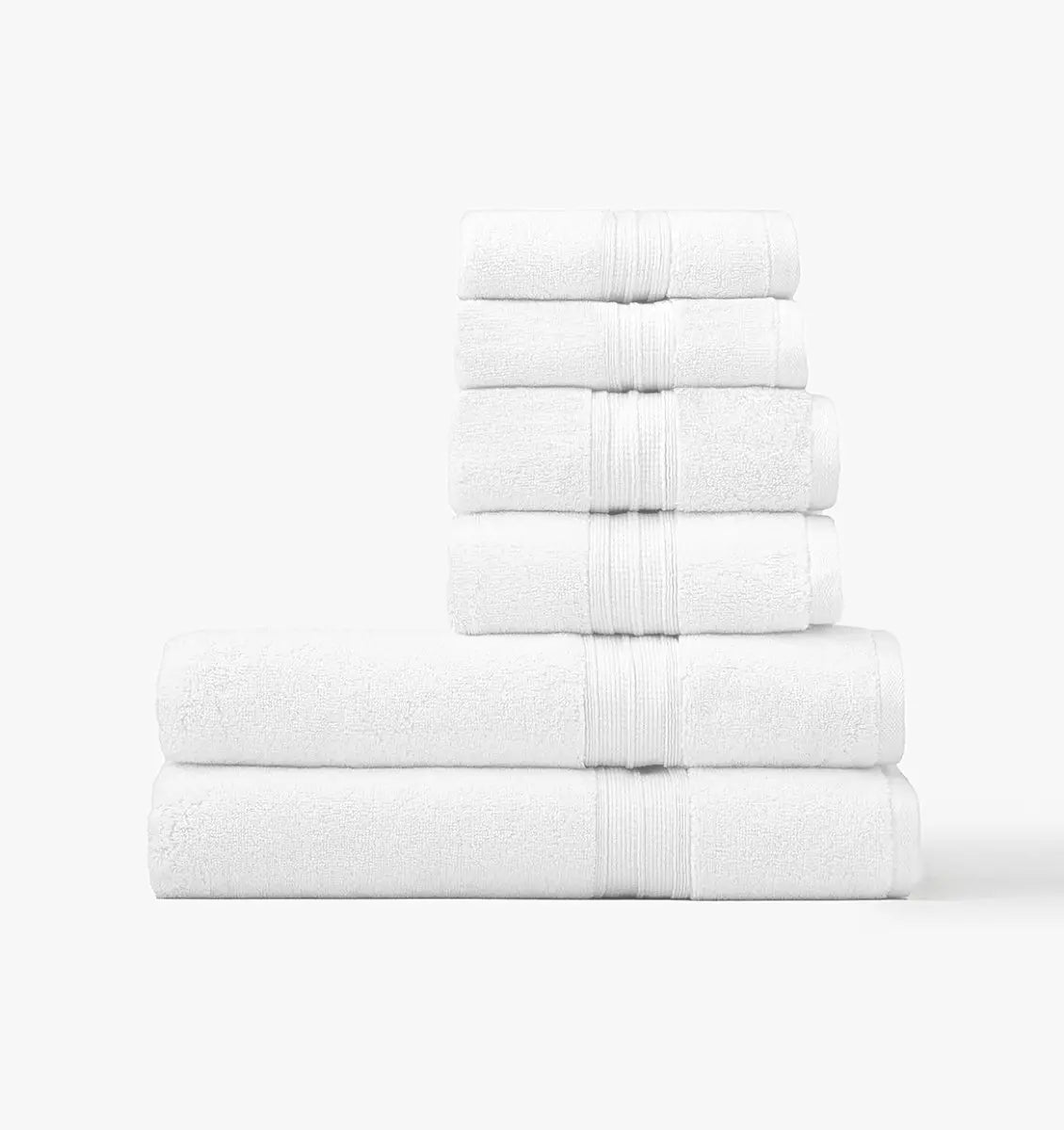Stack of super plush white towel bundle on white background
