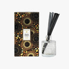 Voluspa Baltic Amber Diffuser set with decorative box and glass diffuser bottle on a white background