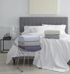 Sferra Corino Blankets shown on a bed | Duman Home